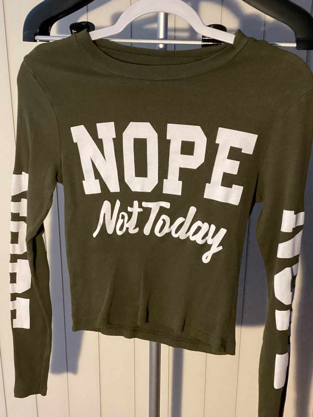 On Fire Olive Green Long Sleeve Graphic Top with White Lettering